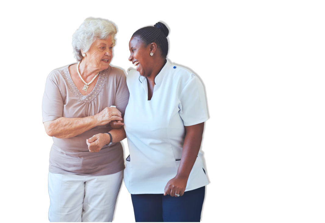 senior woman and caregiver smiling